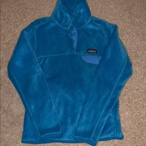 Small light blue Patagonia fleece pullover
